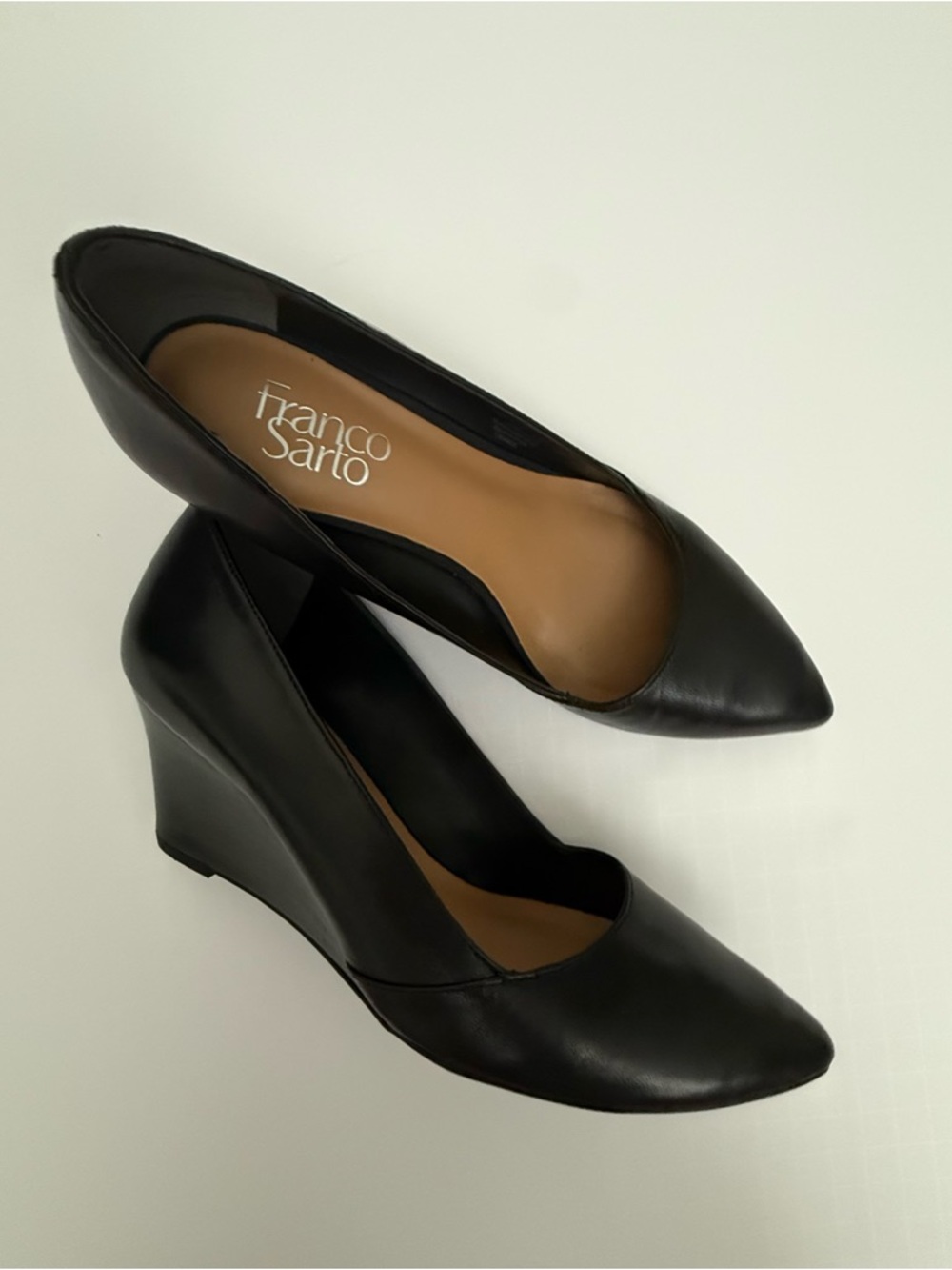 Women’s size 7.5 Franco Sarto Black Leather Wedge Pumps